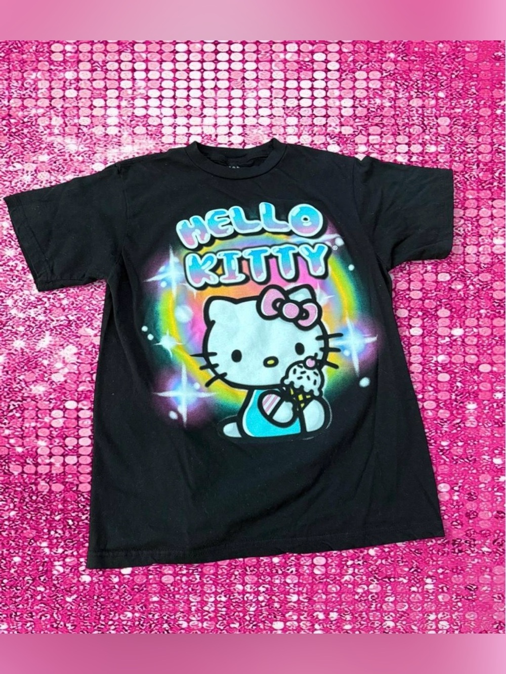 Sanrio Hello Kitty black cotton t-shirt with Hello Kitty graphic holding an ice